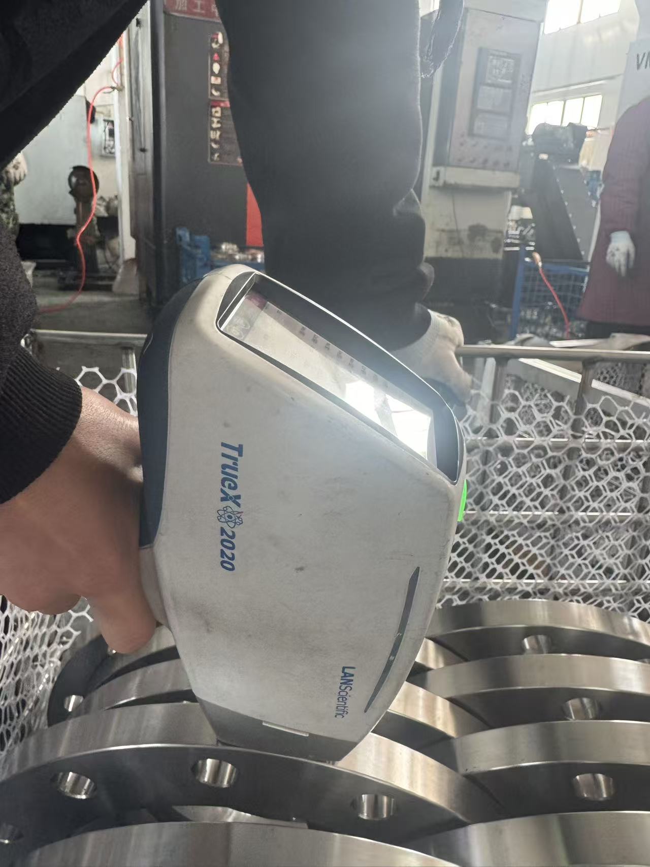 Material inspection with a spectrometer
